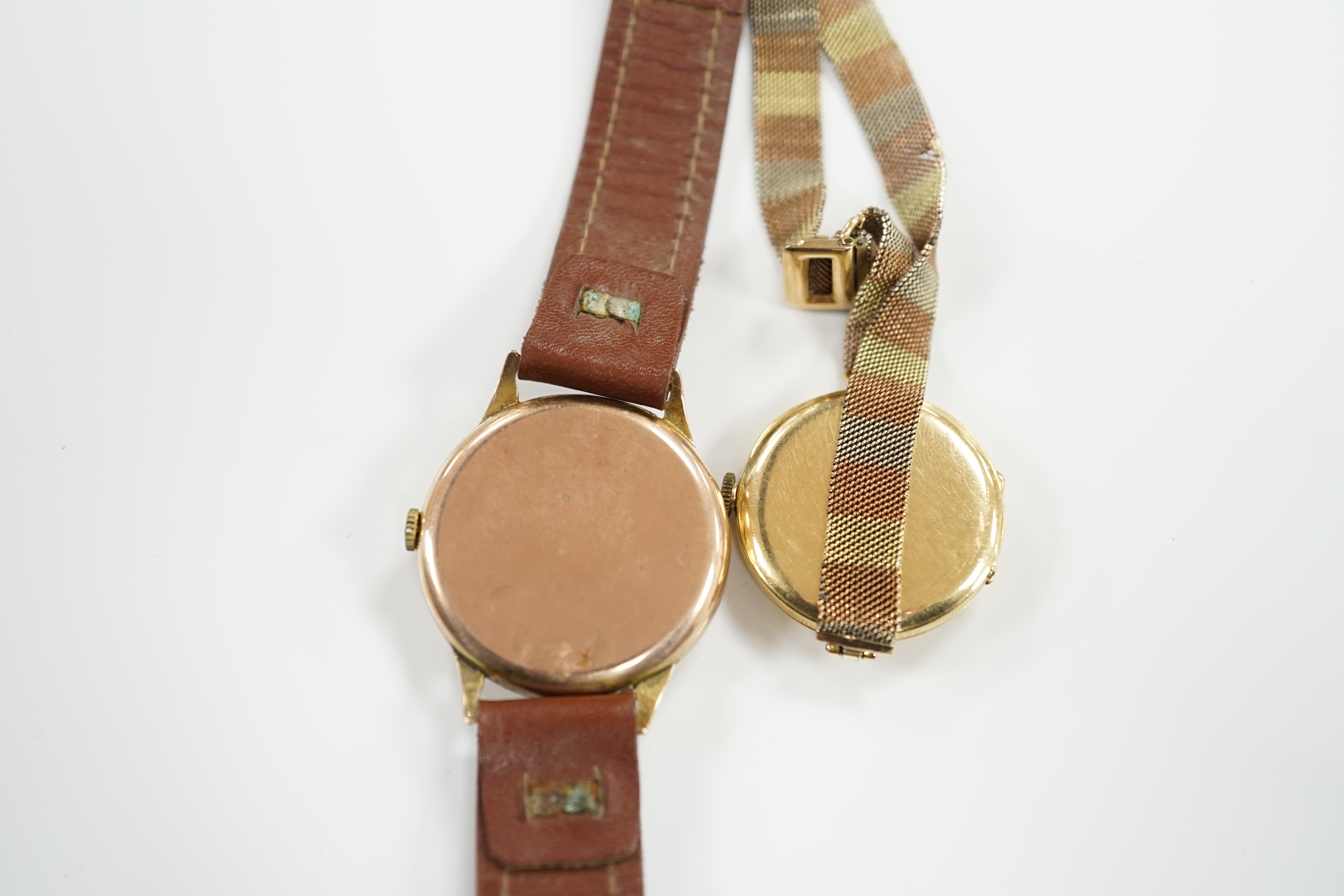 An early 20th century 18ct gold manual wind wrist watch, by Wilsdorf & Davies, on a later three colour 9ct mesh link bracelet and a gentleman's yellow metal Majex manual wind wrist watch, on a leather strap.